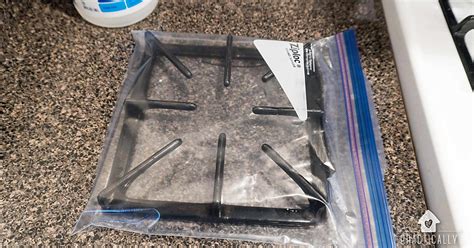 how to clean the cast iron grates on my gas stove